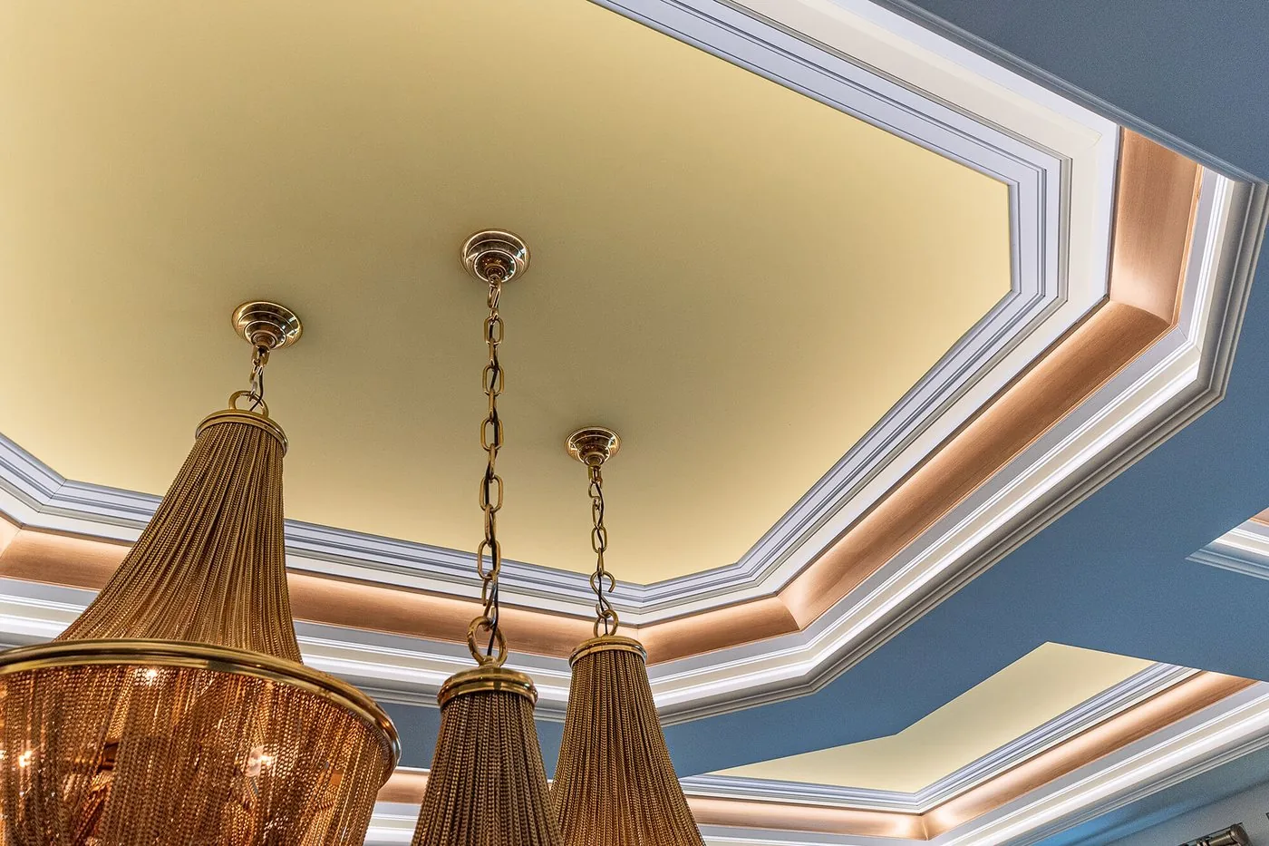 Coffered ceiling with layered molding and a painted inset
