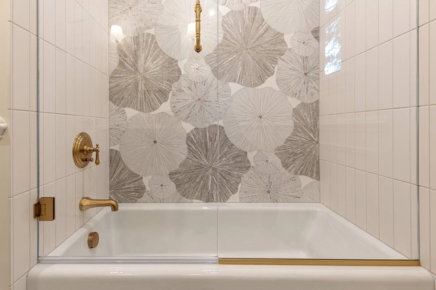 Tub and shower surround in patterned tile