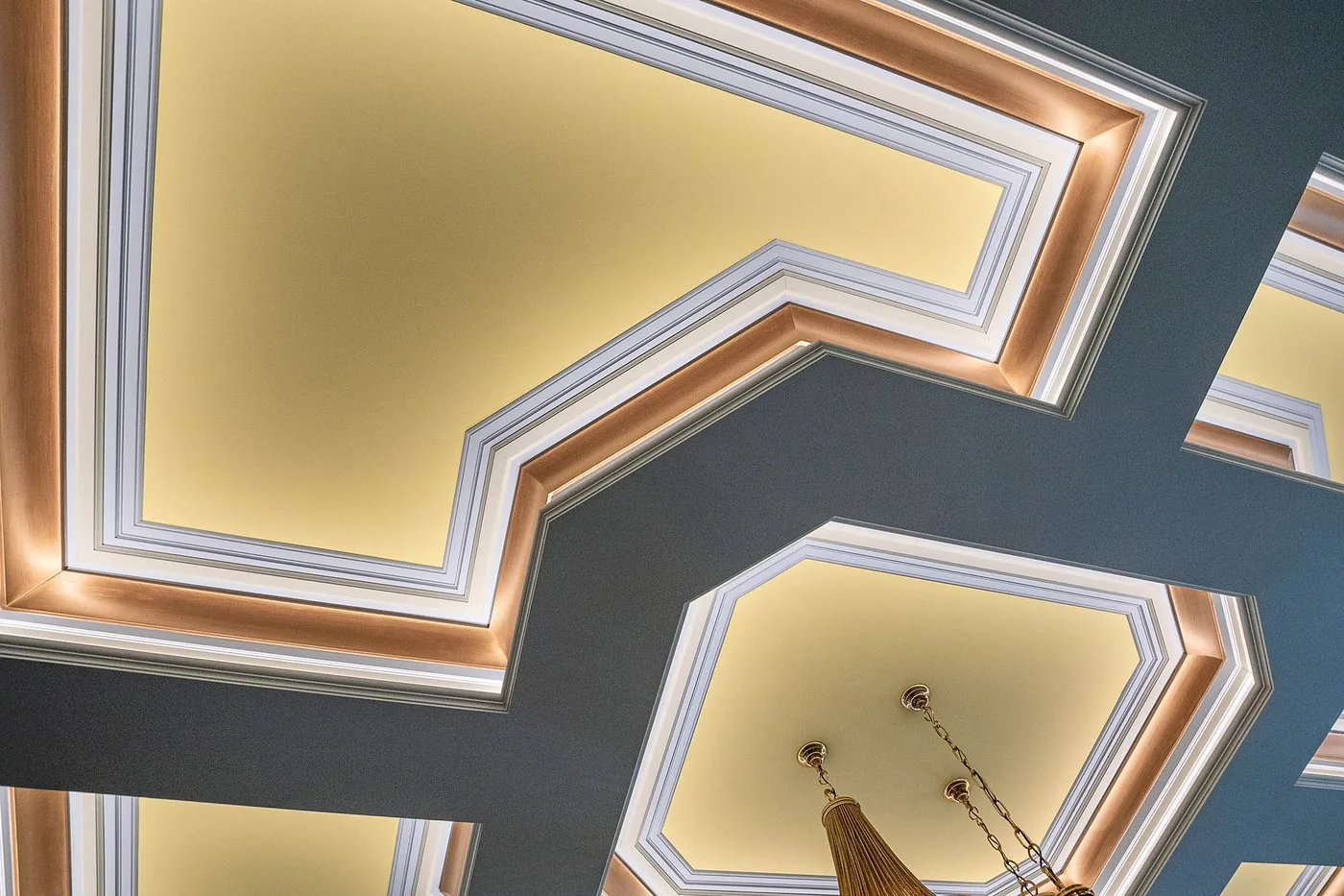 Coffered ceiling with layered molding and a painted inset