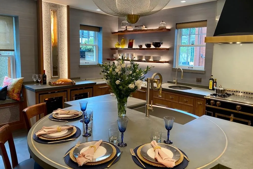 Kitchen with open shelving and a marble counter