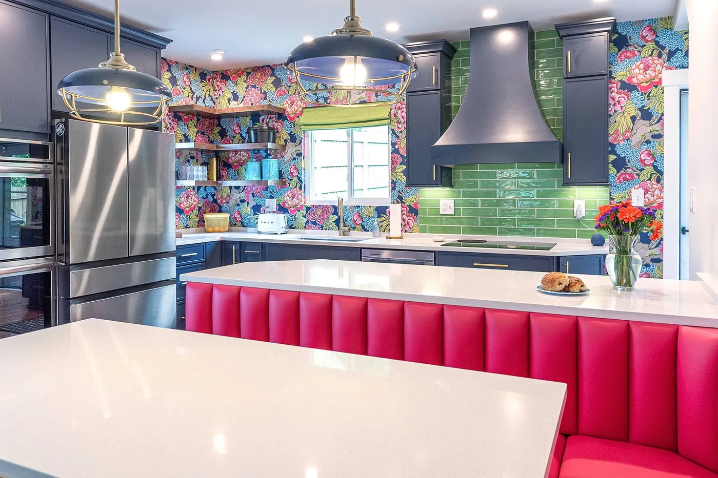 Kitchen with a white counter and banquette seating