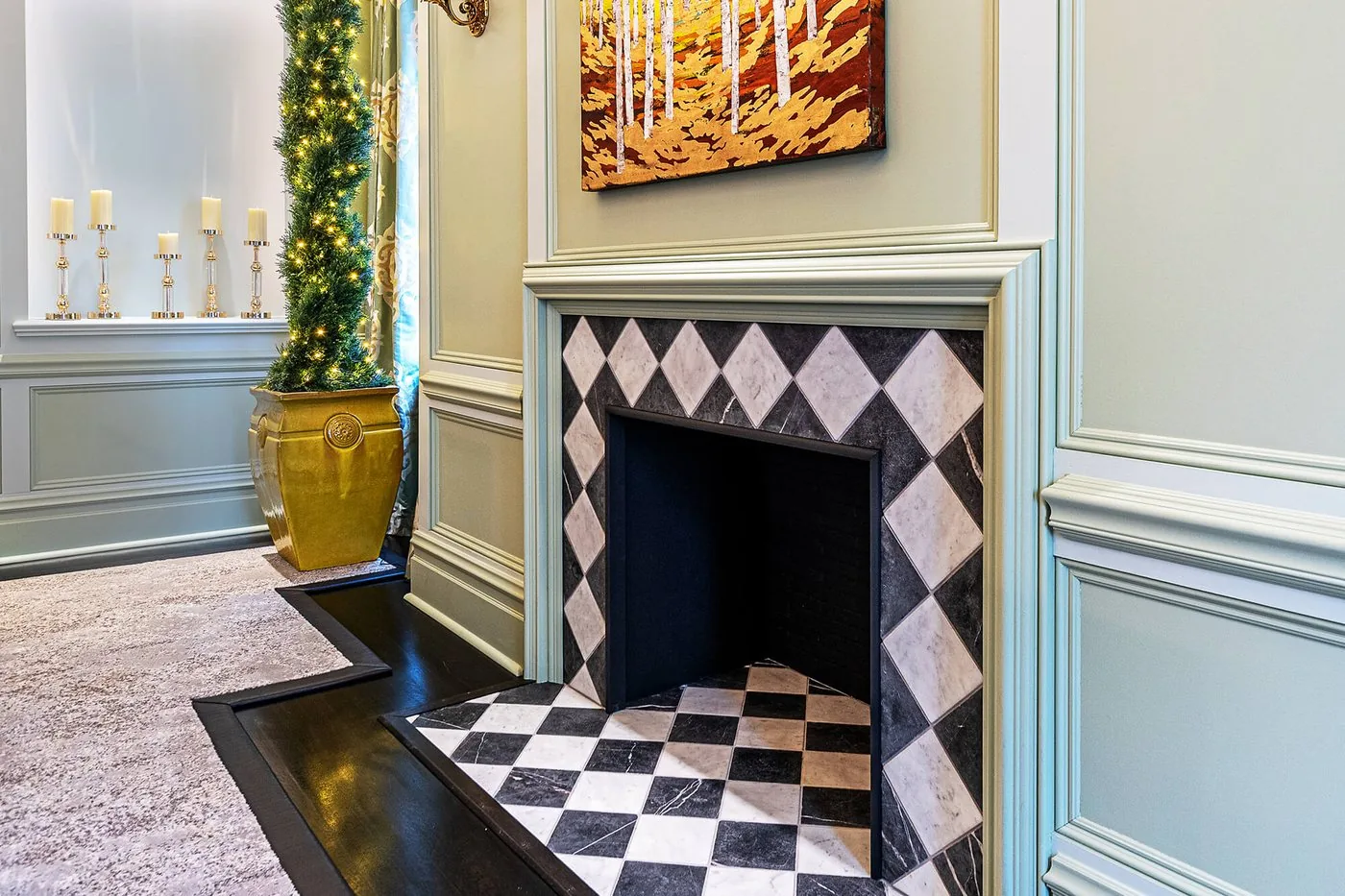 Living room with a checkered tile hearth and a painted fireplace surround